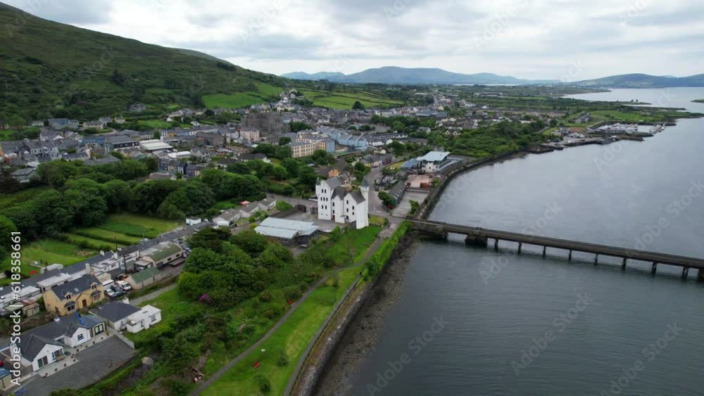 Aerial dolly forward drone shot of Caherciveen from Valentia River, Ireland Aerial dolly forward drone shot of Caherciveen from Valentia River, Ireland