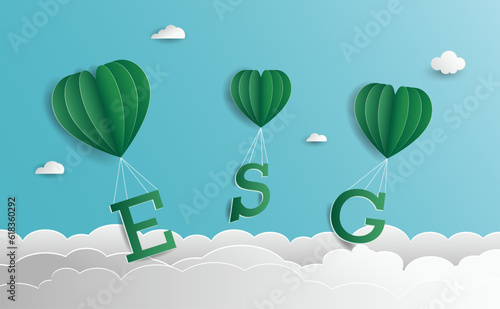 ESG word The green balloon floated on the clouds with the sky background Vector illustration, (ESG) environmental social governance Paper cut art out style concepts. photo