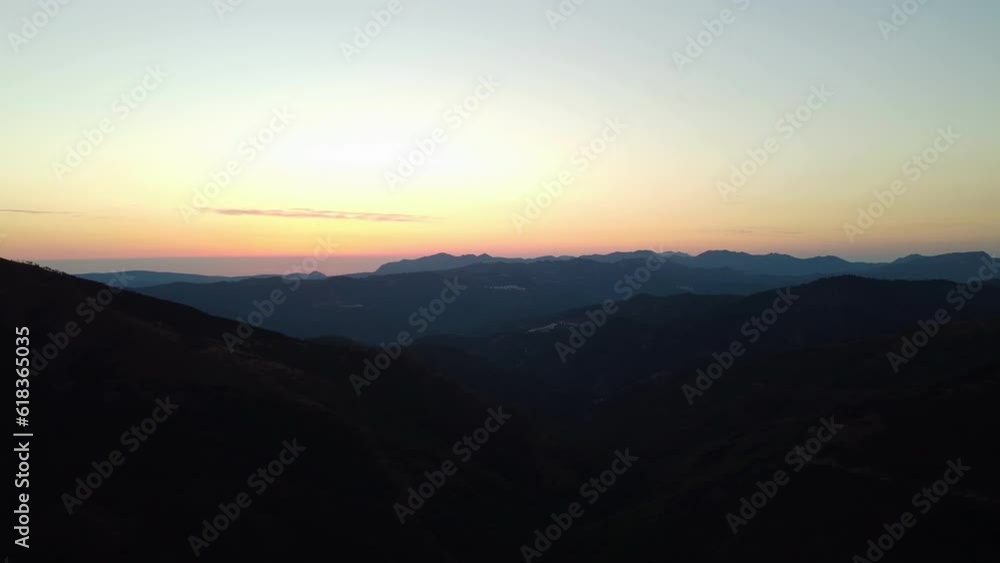 A drone captures a high altitude sunset in the Sierra Bermeja near Estepona. A drone captures a high altitude sunset in the Sierra Bermeja near Estepona.