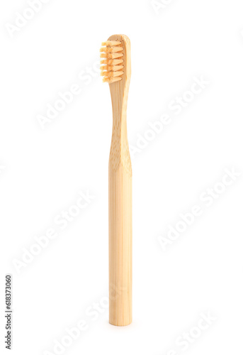Bamboo tooth brush on white background