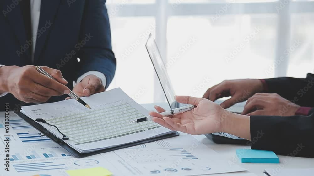 Close up of Business team analyzing income charts and graphs with modern laptop computer. Business analysis and strategy concept. Close up of Business team analyzing income charts and graphs with modern laptop computer. Business analysis and strategy concept.