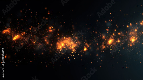 Sparks fly up glowing particles on a black background