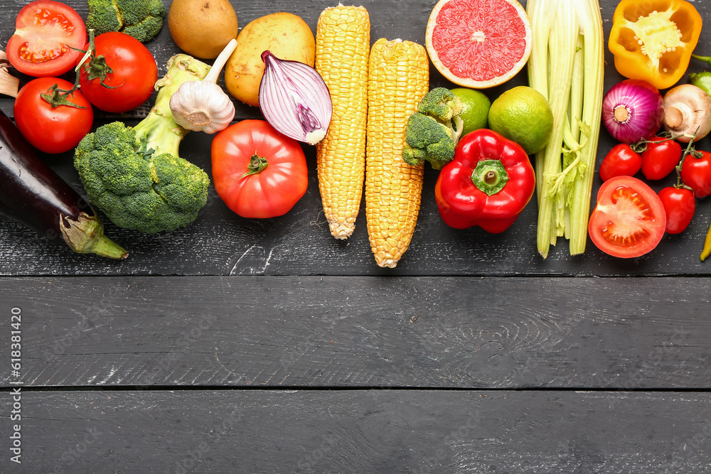 Fresh ripe vegetables on dark wooden background Fresh ripe vegetables on dark wooden background