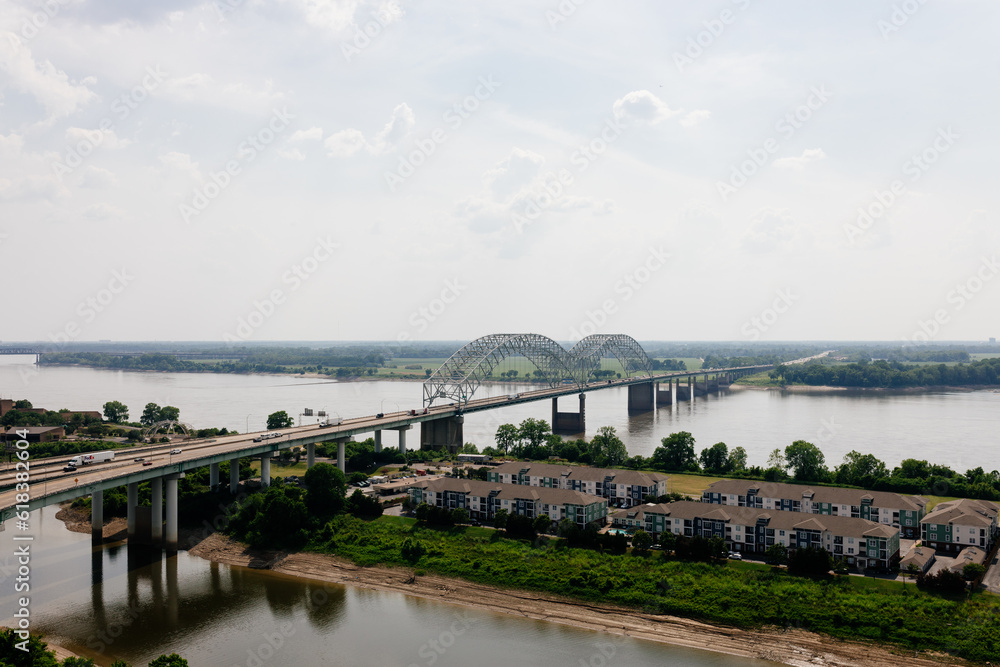 Big beautiful bridge across the river on a cloudy summer day. Bridge in Memphis, Tennessee aerial view on spring day