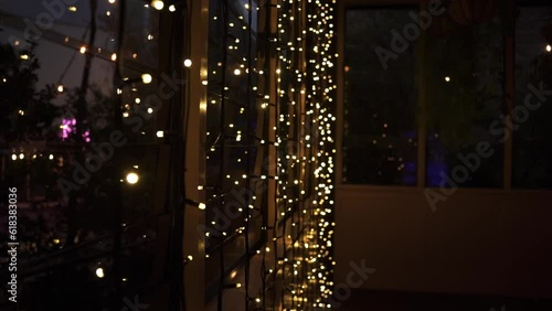 Fairy Lights Hanging In A Window At Night - close up