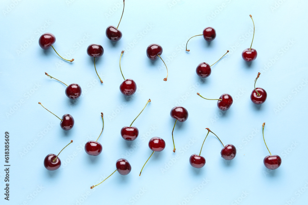 Many sweet cherries on blue background Many sweet cherries on blue background