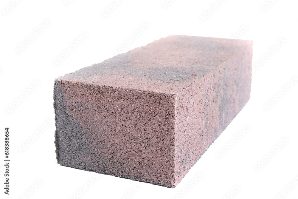 white background. brick made of concrete. multi-colored block for laying a post on the fence. close-up. white background. brick made of concrete. multi-colored block for laying a post on the fence. close-up.