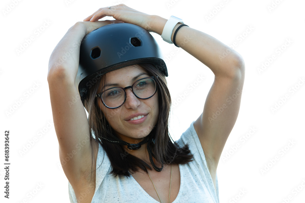 Female skateboarder waiting at outdoor skatepark Female skateboarder waiting at outdoor skatepark