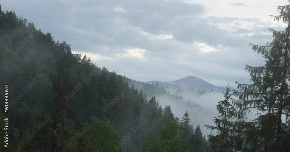 Timelapse of a mountain landscape in rainy and foggy weather. Timelapse of a mountain landscape in rainy and foggy weather.