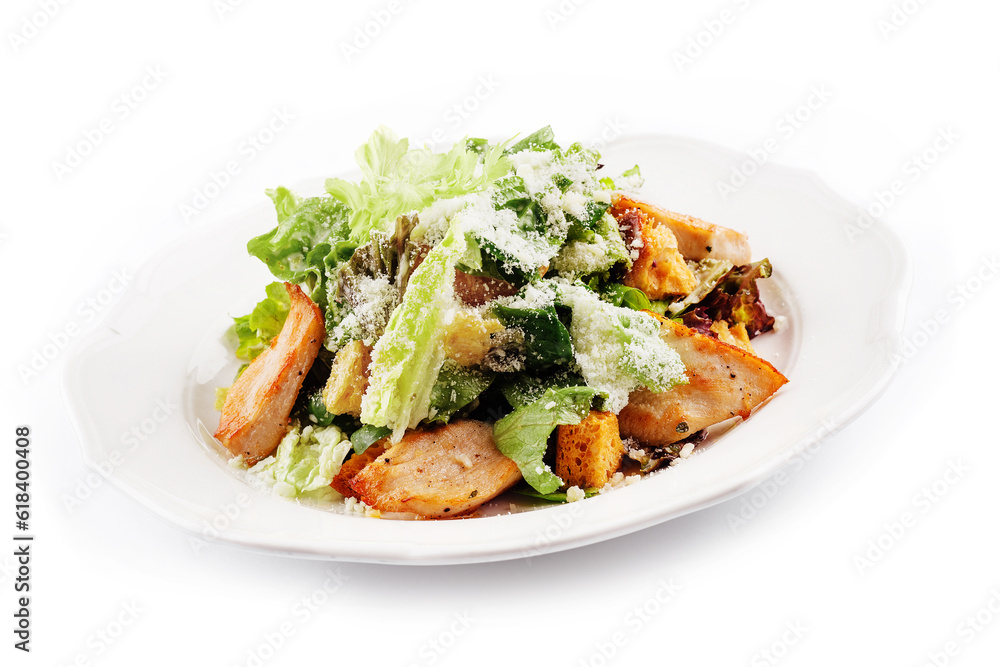 Traditional classic Caesar salad in white plate Traditional classic Caesar salad in white plate