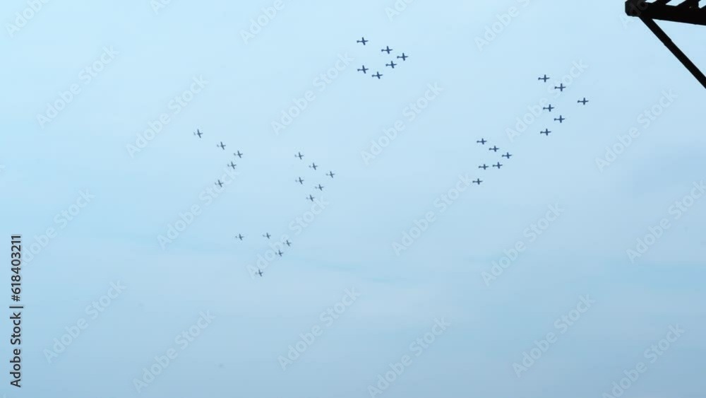 military airplane fighters swarm formation fly over city military airplane fighters swarm formation fly over city