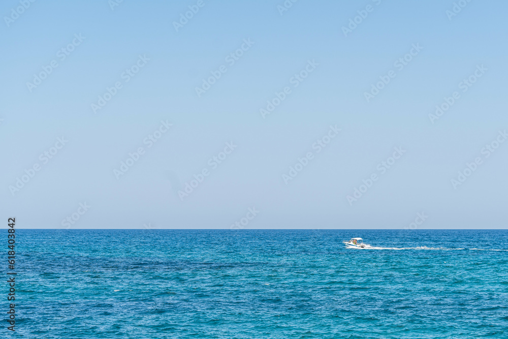 Mediterranean sea and sail of motorboat on spanish seaside