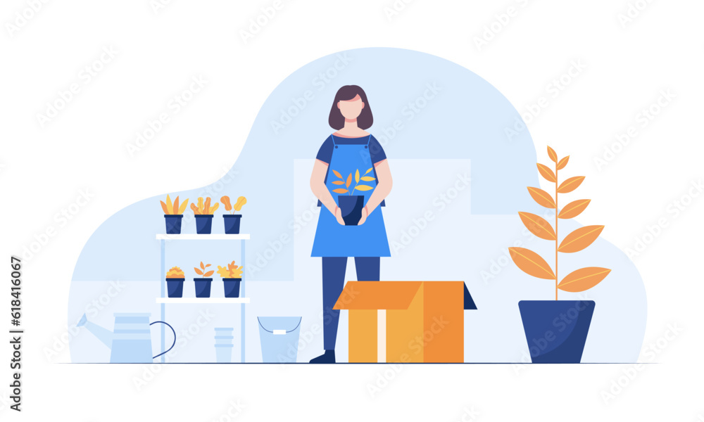 A young gardener packs plants into packages to deliver to customers who have placed an order. A young gardener packs plants into packages to deliver to customers who have placed an order.