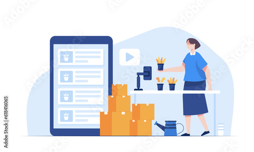 A young woman presents and sells plants via video streaming from her home.