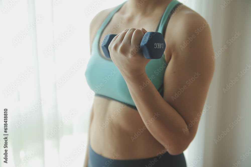 Woman exercise workout in gym fitness breaking relax holding apple fruit after training sport with dumbbell and protein shake bottle healthy lifestyle bodybuilding, Athlete builder muscles lifestyle. Woman exercise workout in gym fitness breaking relax holding apple fruit after training sport with dumbbell and protein shake bottle healthy lifestyle bodybuilding, Athlete builder muscles lifestyle.