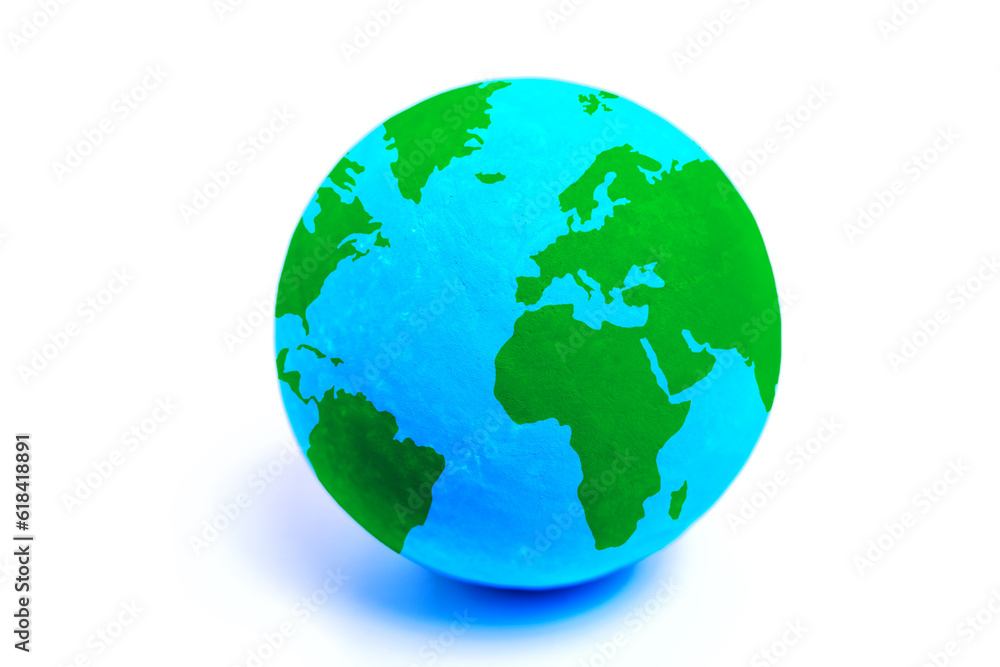 Miniature Globe with Green Continents on White Background Miniature Globe with Green Continents on White Background