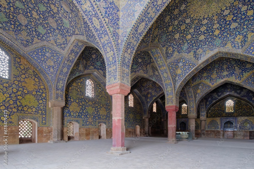 Interior of the expansive and ornately decorated Great Mosque of Isfahan in Iran