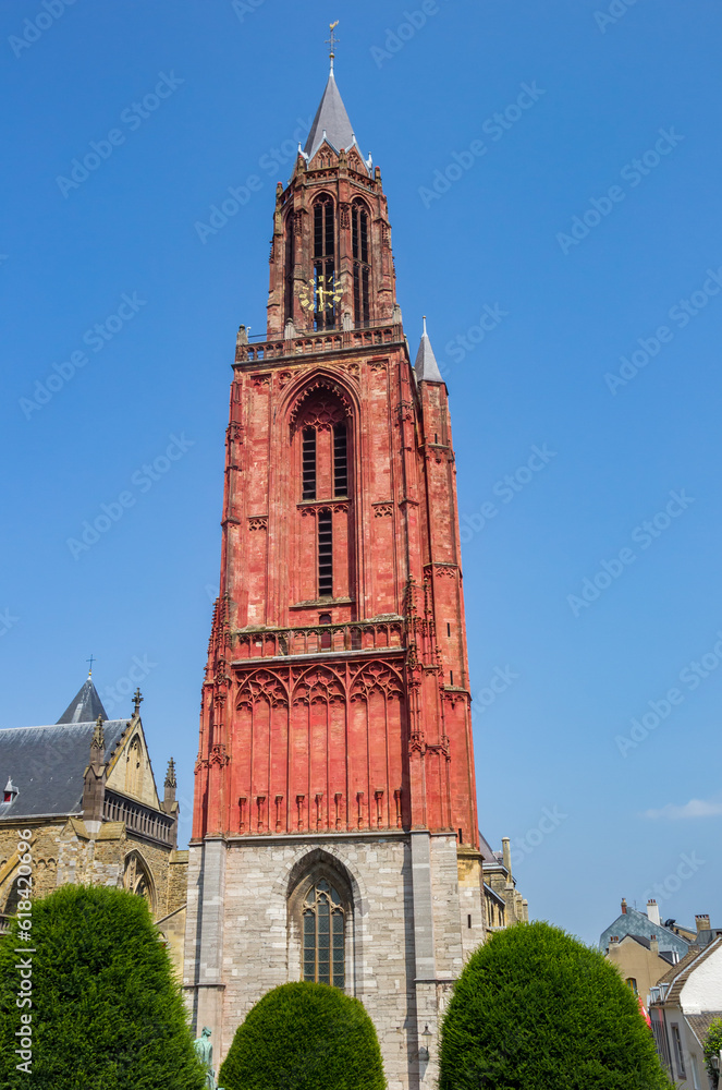 Red tower of the St. Jan church in Maastricht, Netherlands