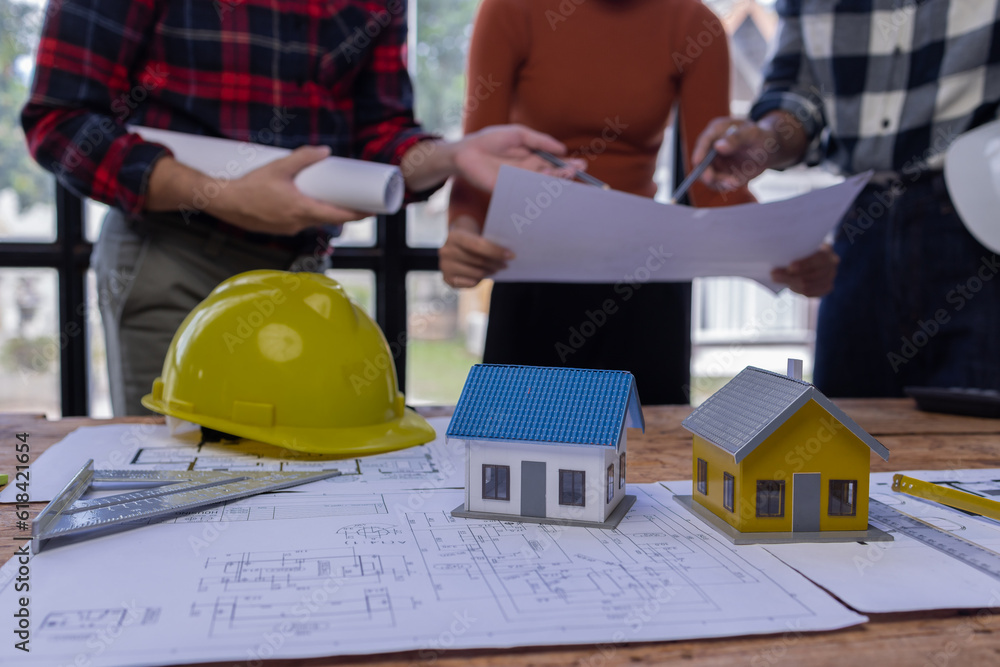 Engineer Teamwork Meeting, Architect contractor meetings of real estate brokers and company presidents to select a model to build a housing estate in writing and presenting to state organizations. Engineer Teamwork Meeting, Architect contractor meetings of real estate brokers and company presidents to select a model to build a housing estate in writing and presenting to state organizations.