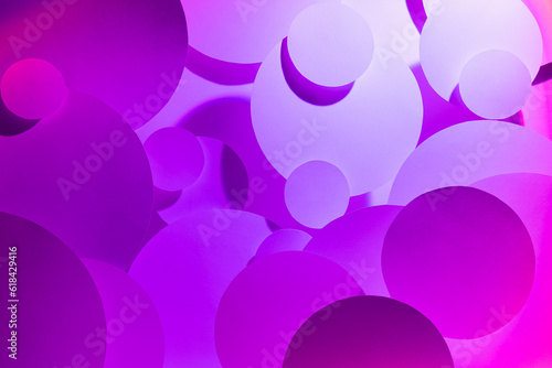 Colorful violet pink gradient abstract background of fly paper circles pattern shine in light, top view, backdrop for advertising, design, card, poster, flyer, elegant fashion modern simple style. © finepoints