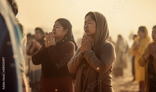 Prayer, faith and peace with woman in nature for worship, zen and spirituality. Praying, ai generated and connection with women at beach and traditions for god, mindfulness or chakra practice © Chanelle/Peopleimages - AI