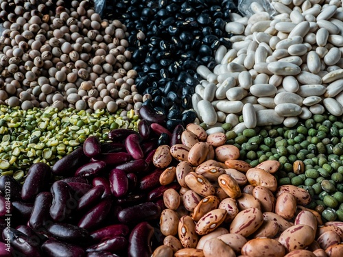 Variety of colorful beans and legumes arranged on a platter