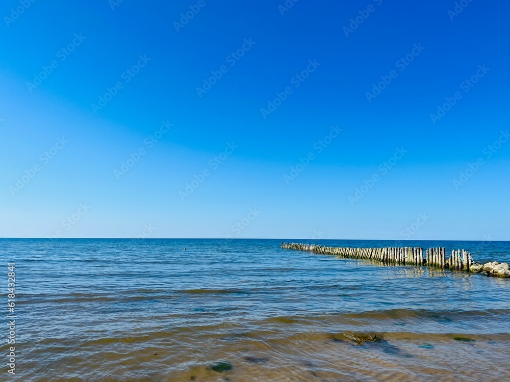 Blue seascape, sea coast, clear blue sky