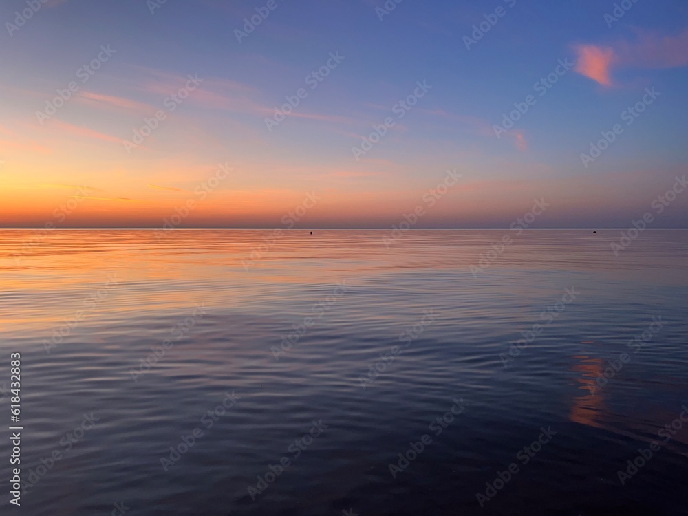 tender evening seascape, orange sea horizon, peaceful sea view