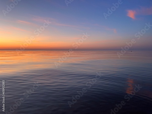 tender evening seascape, orange sea horizon, peaceful sea view