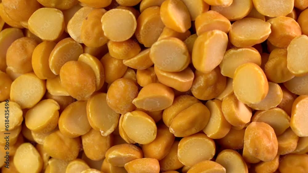 Closeup of a bunch of spinning organic yellow split peas Closeup of a bunch of spinning organic yellow split peas