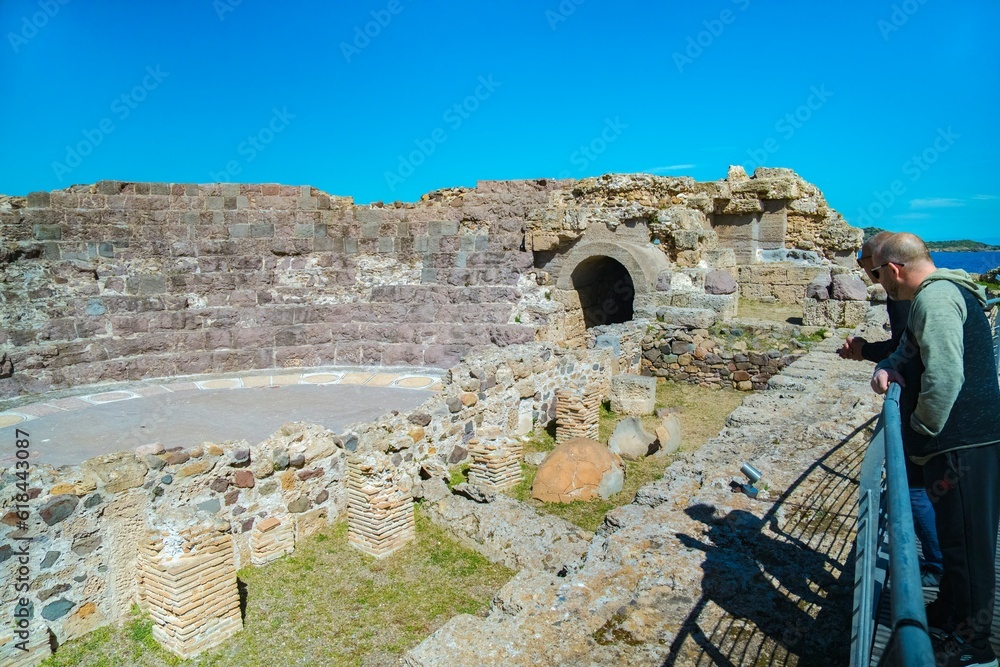 Historical and archaeological heritage of Nora, southern Sardinia, with tourists