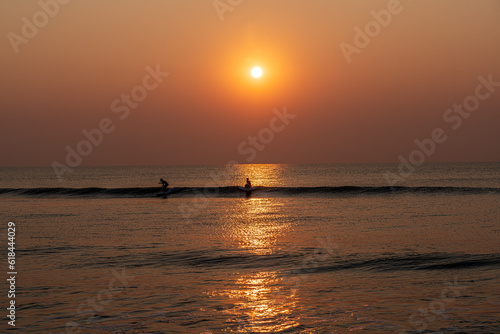 Surfers at Sunrise