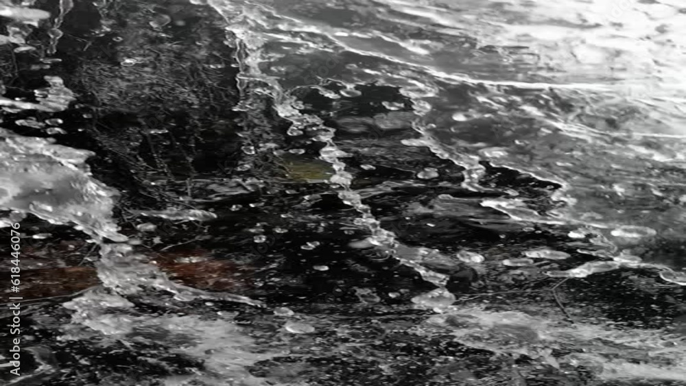 Slow motion of water splashing against the rocks Slow motion of water splashing against the rocks