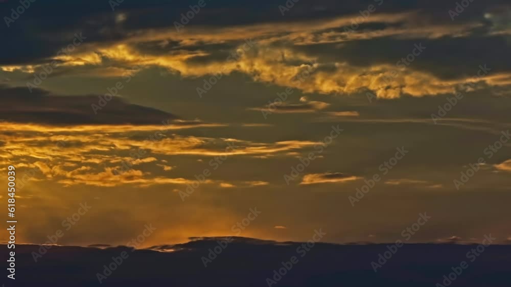 High angle shot of red sky and beautiful clouds at sunset High angle shot of red sky and beautiful clouds at sunset