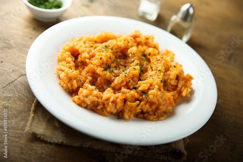 Traditional homemade risotto with tomatoes
