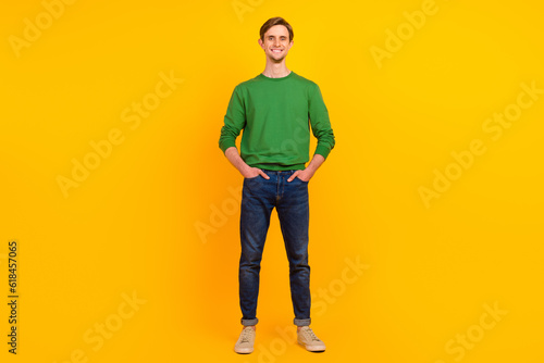 Full body portrait of content clever intelligent executive man wear stylish clothes isolated over yellow color background