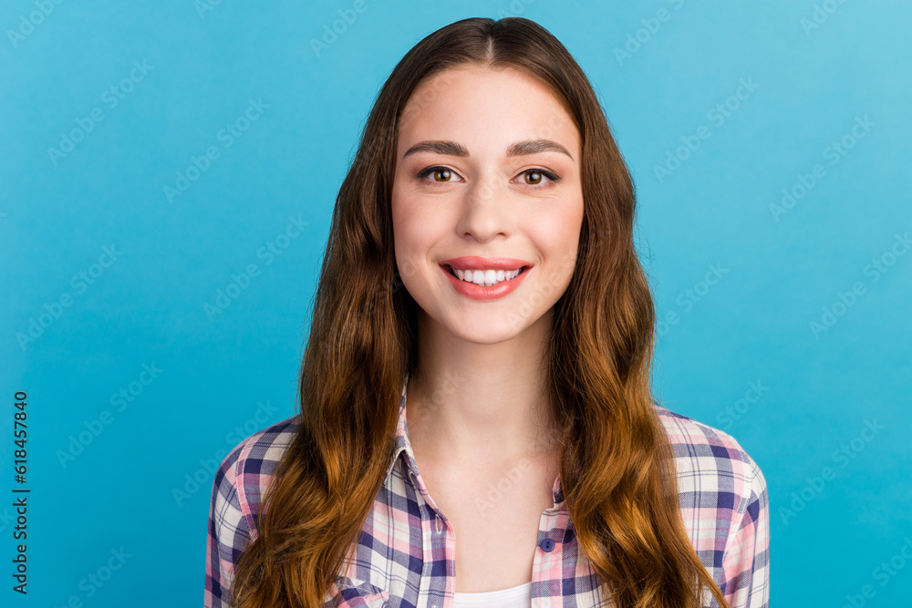 Close-up of happy professional positive girl toothy smiling at camera isolated blue background Close-up of happy professional positive girl toothy smiling at camera isolated blue background