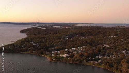 Murrays beach lakeshore town in Wallarah woods on Pacific coast of AU 4k.
 photo