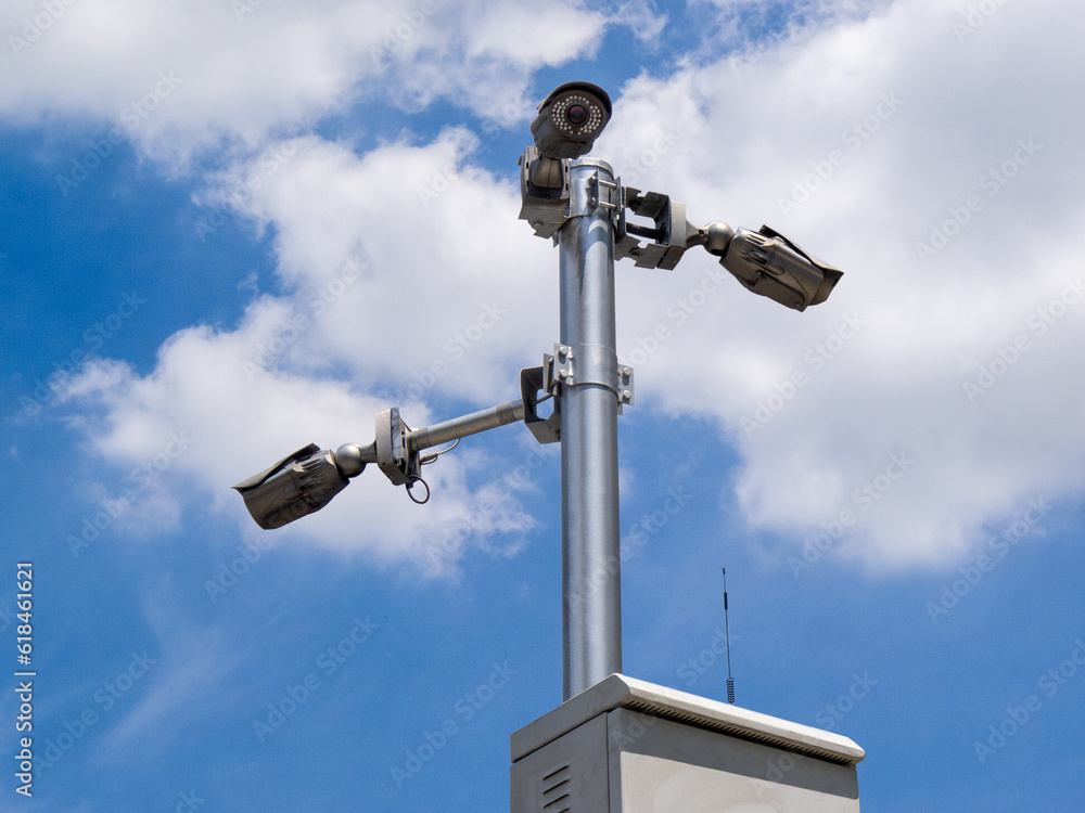 CCTV cameras on metal pole in public place CCTV cameras on metal pole in public place