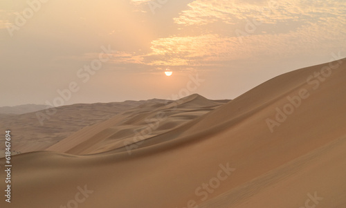 Sand Dunes in the Desert outside Abu Dhabi at Sunset- Empty Quarter, United Arab Emirates 