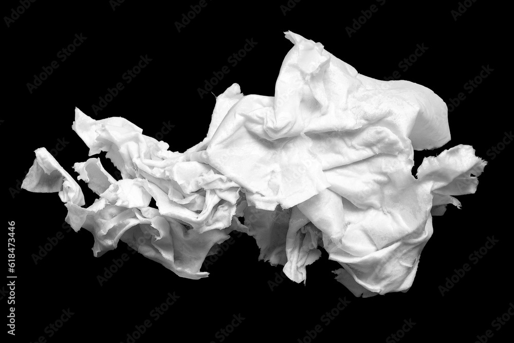 Wet wrinkled paper. Crumpled sheet of wet paper on a black background. Selective focus Wet wrinkled paper. Crumpled sheet of wet paper on a black background. Selective focus