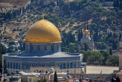 Zoom in on the Dome of the Rock and and the Church of Mary Magdalene in the background 