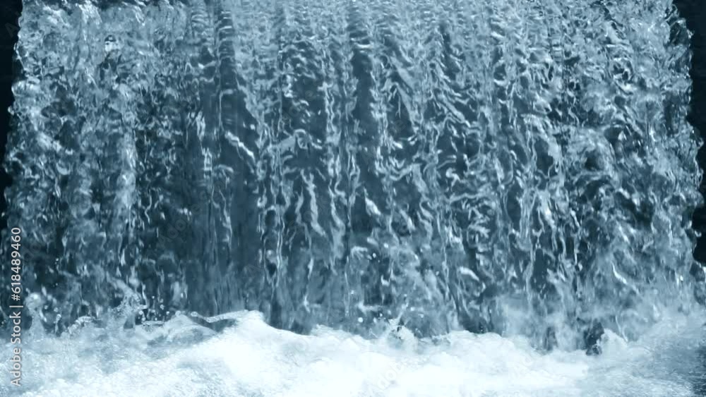 Beautiful natural waterfall background with falling crystalline water flow and splashing drops with foam. Scene with blue and cyan color, perspective, mid shot, super slow motion, hd. ProRes 422 HQ. Beautiful natural waterfall background with falling crystalline water flow and splashing drops with foam. Scene with blue and cyan color, perspective, mid shot, super slow motion, hd. ProRes 422 HQ.