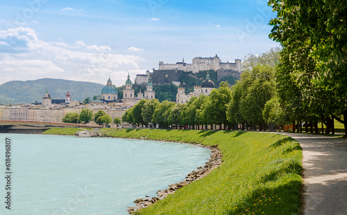 Salzburg, city in Austria, with Old Town and historic centre, seen from Salzach river and Franz-Josef-Kai, with Salzburg Cathedral, and Hohensalzburg Fortress. Festival city and birthplace of Mozart.