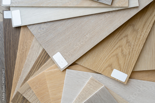 Wooden flooring samples. Architect or interior designer flat lay composition. Try before buy sample, choosing different wood floor shades and textures.