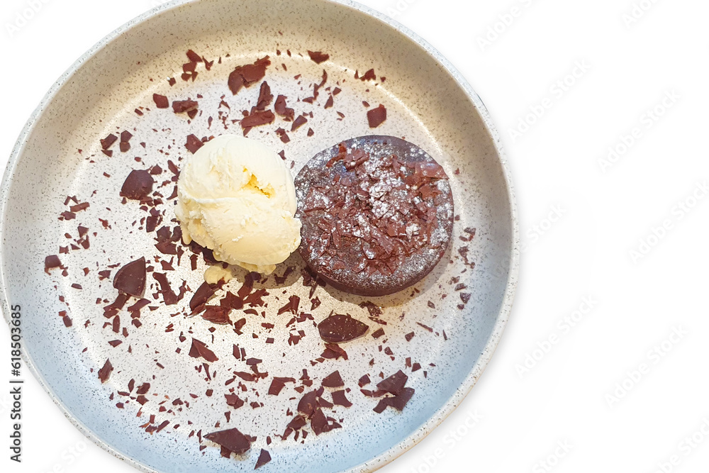Chocolate lava cake and Ice cream with chocolate flakes on white background.