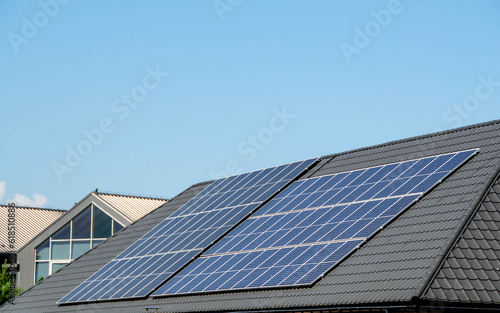 House roof with photovoltaic modules.