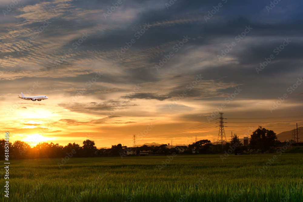Commercial airplane above sea with sunset in summer season over beautiful scenery background, Concept business travel and transportation summer vacation travel. Commercial airplane above sea with sunset in summer season over beautiful scenery background, Concept business travel and transportation summer vacation travel.