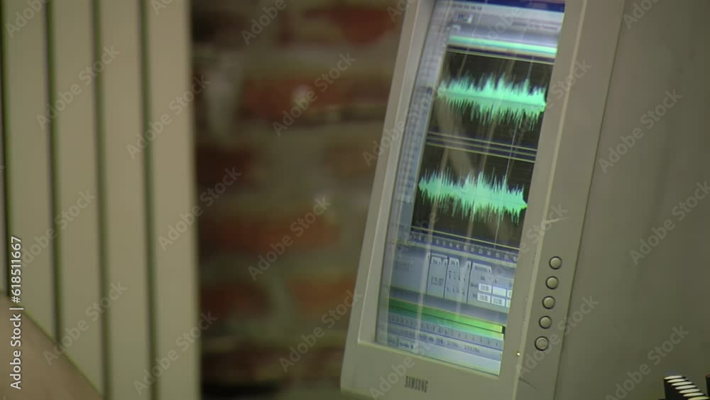 Computer Monitor Screen with Sound Audio Wave Graph in Recording Studio ...