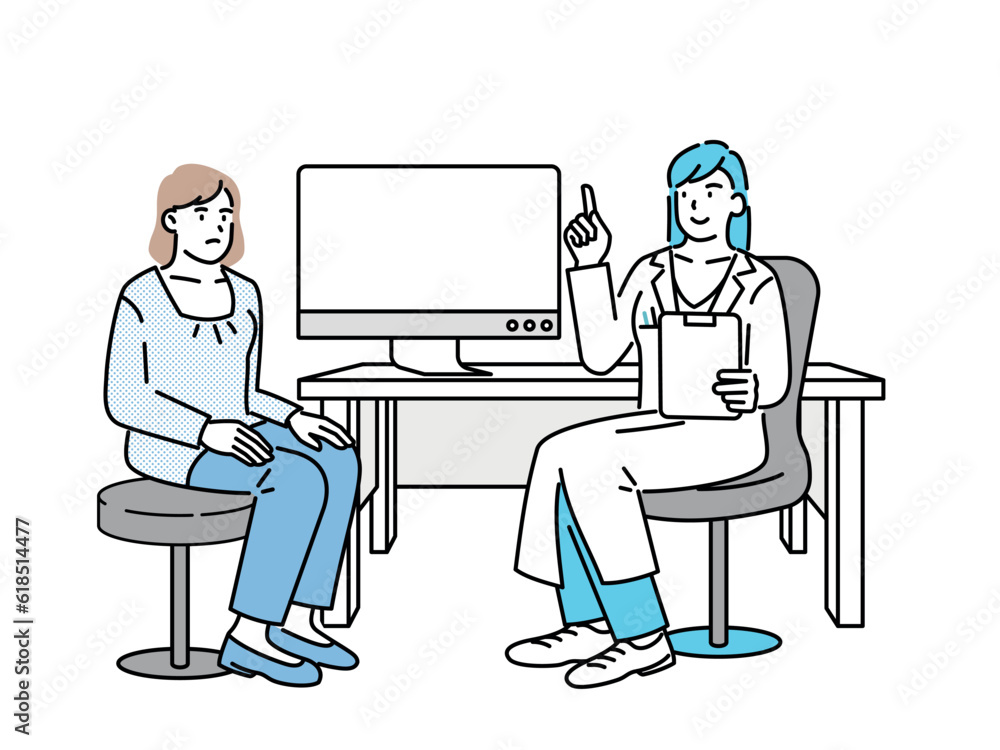 A woman being seen by a doctor in a hospital A woman being seen by a doctor in a hospital